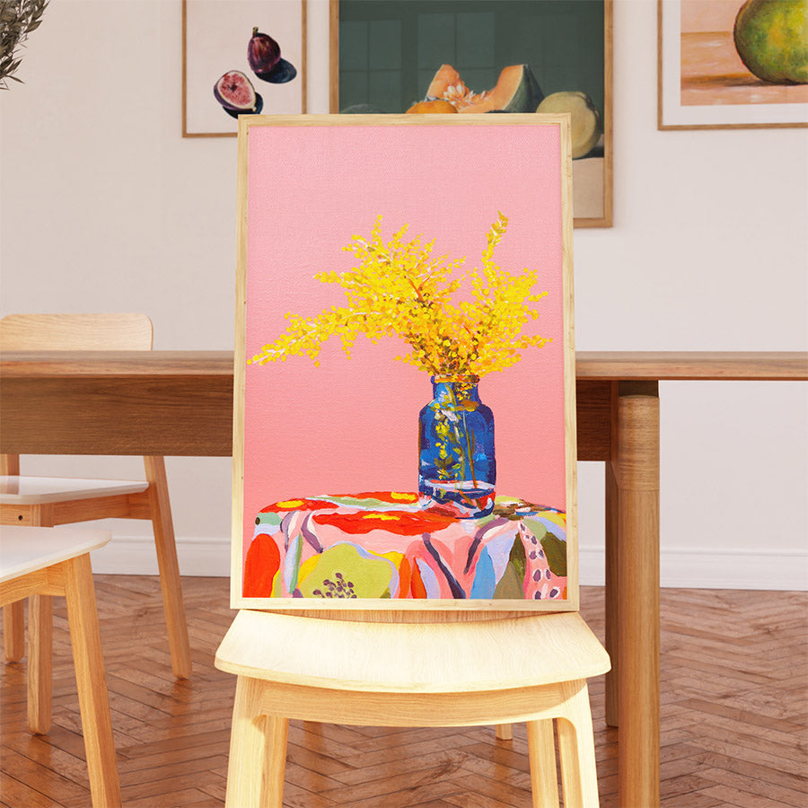 a painting of a vase with yellow flowers on a table