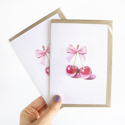 Demure Cherries Greeting Card