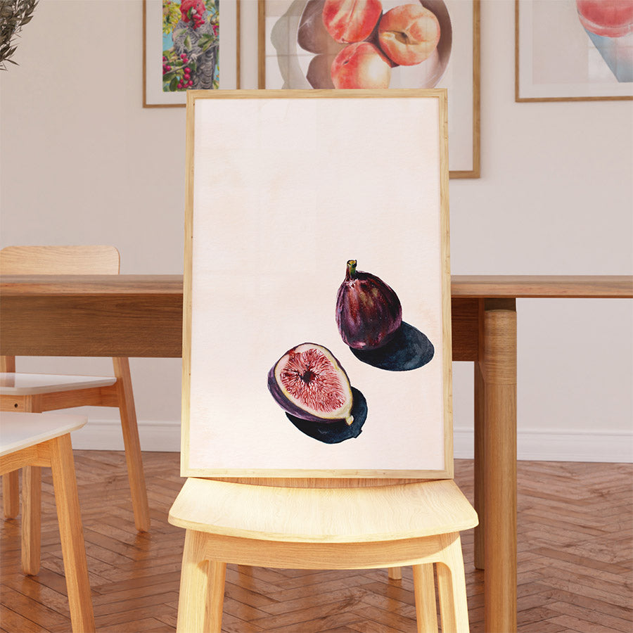 a table with a chair and a painting on it